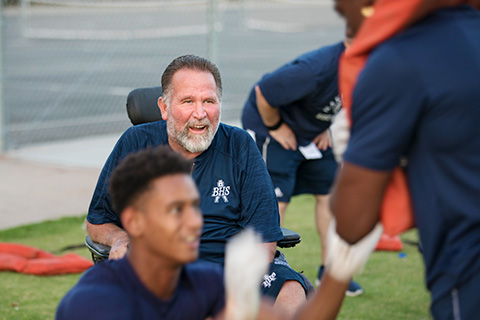 Coach Lance McCullah on the field.