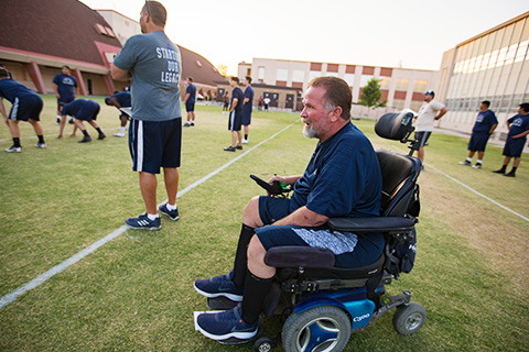 Coach Lance McCullah on the sideline.