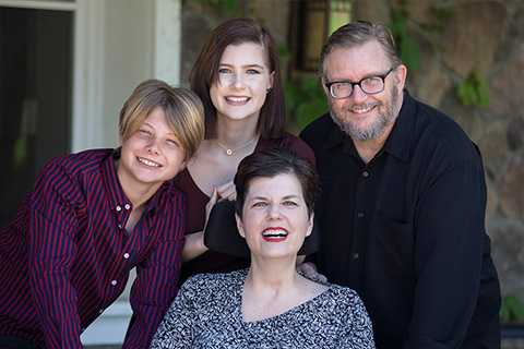 Mary Huffman with her husband and two kids.